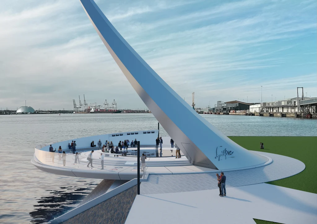 A modern waterside structure curves upward over the water, with people gathered on the platform. In the background are cranes, boats, and industrial buildings under a partly cloudy sky.